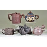 Five Chinese Yixing Stoneware Teapots and Covers, including - hand and wrist, 3.25ins (8.3cm)