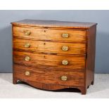 A George III Figured Mahogany Bow Front Secretaire Chest, the top inlaid with stringings and with