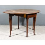 An 18th Century Mahogany Oval Dropleaf Cottage Dining Table, on turned legs and pad feet, 40ins x