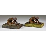 Early 20th Century Continental School - Two similar bronze desk weights modelled with kneeling naked