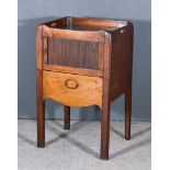 A George III Mahogany Tray Top Table, with handle cut-outs to tray top, enclosed by tambour shutter,