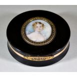 A Tortoiseshell and Gold Circular Box, 19th Century, the lid with an oval painted miniature of a