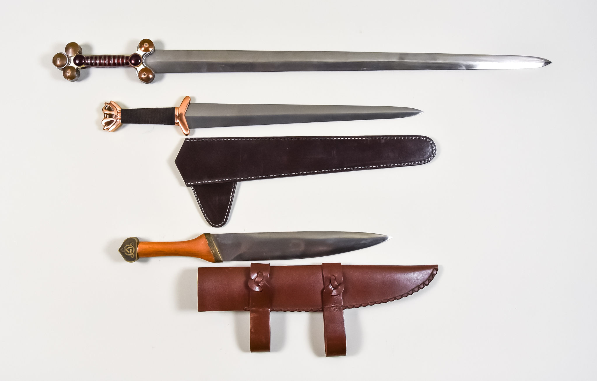 Five Reproduction Celtic Edged Weapons, Modern, including - three swords and two daggers, sizes