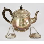 A George V Silver Bachelors Teapot, by Hukin & Heath Ltd., Birmingham 1924, of circular bulbous