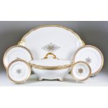 A W M Guerin Limoges Porcelain Part Dinner Service, Early 20th Century, the centres with hexagonal