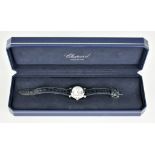 A Lady's Quartz Movement "Happy Sport" Wristwatch, by Chopard, stainless steel case, 30mm