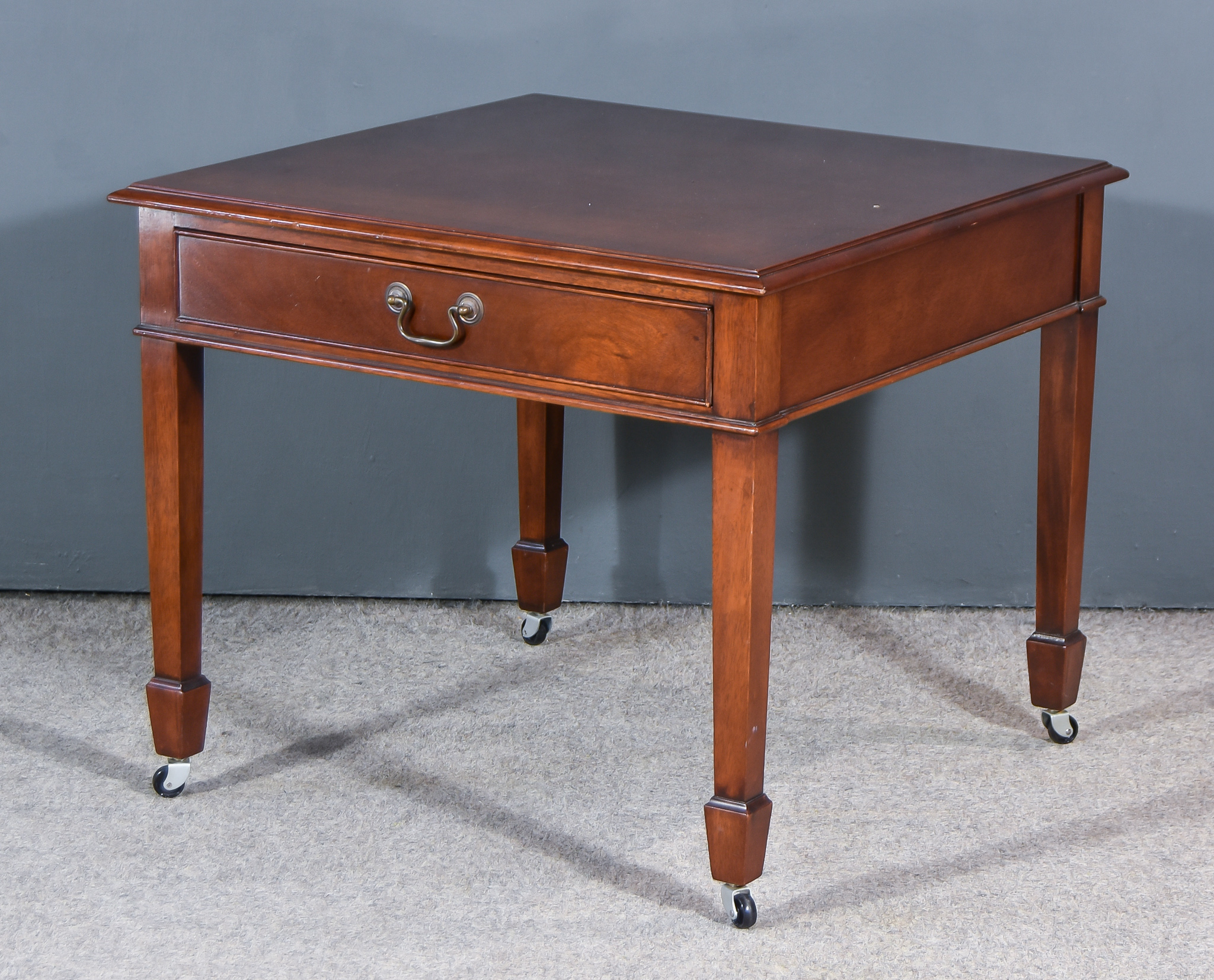 A 20th Century Mahogany Side or Occasional Table, with cross banded and moulded edge to top,