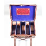 A Good Leather and Oak Cartridge Case, 20th Century, by Army & Navy CCSL, five sections, with