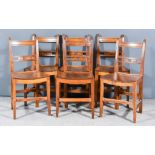 A Set of Six Walnut and Fruit Wood Dining Chairs, with reeded crest rails, splats carved with