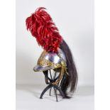 A French Currassier Troopers Helmet, model 1870, bright steel with brass embellishments, horse