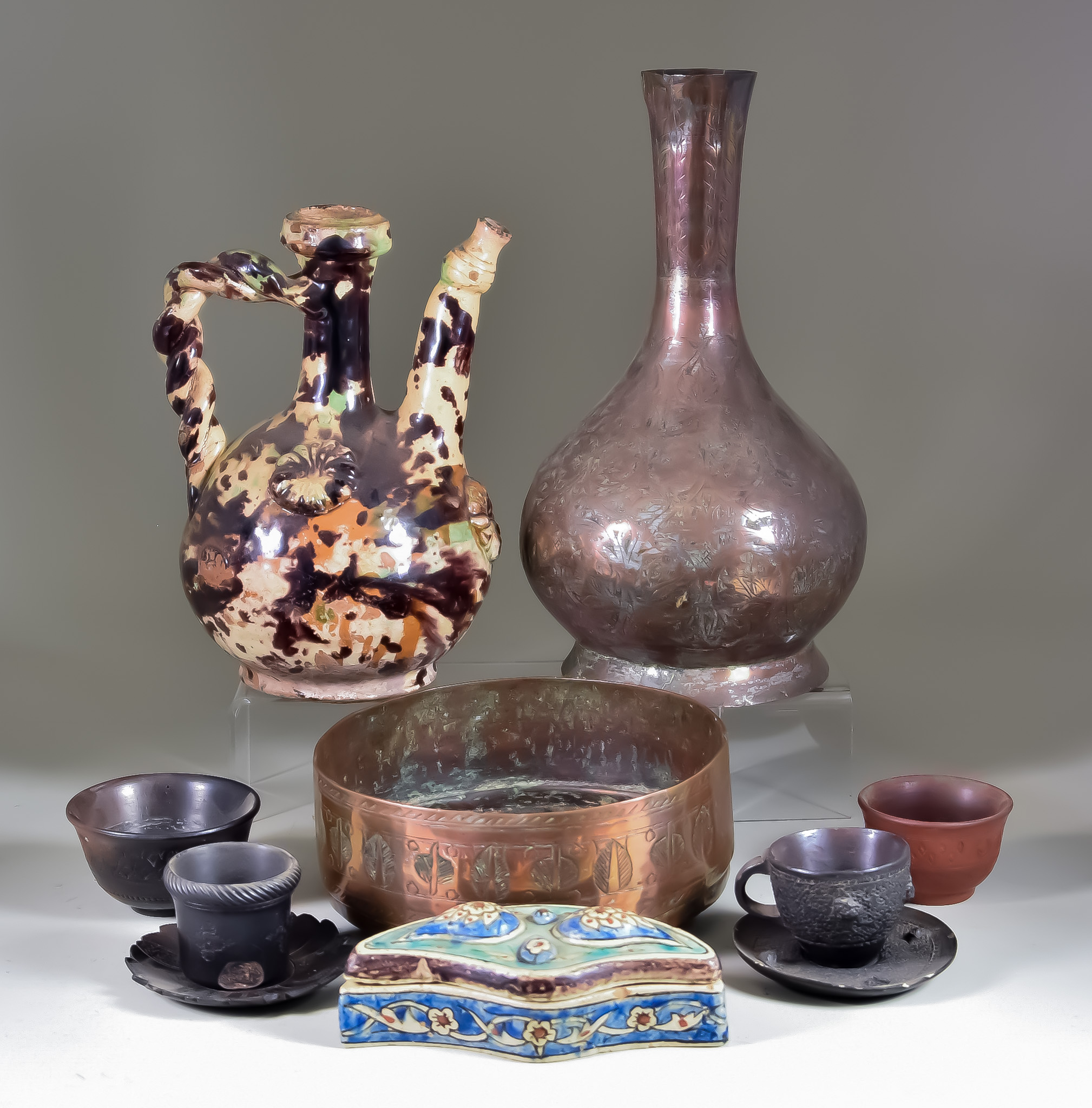 A Near Eastern Copper Bottle Vase, Circular Bowl, and mixed lot of Terracotta and Pottery, the