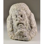 A Medieval Grit Stone Corbel, possibly English, carved as a bearded man, 10ins high