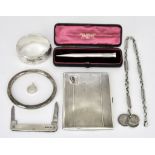 A George VI Silver Rectangular Cigarette Case and Mixed Silverware, the cigarette case by John Henry