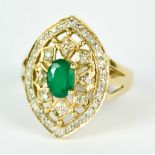 A 10ct Gold Emerald and Diamond Shield Ring, Modern, set with a centre emerald, approximately .75ct,