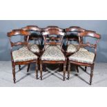 A Set of Six Early Victorian Mahogany Dining Chairs, the shaped crest rails with scroll carvings and