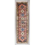 An Early 20th Century Yalameh Runner, woven in pastel shades, with nine hooked lozenge shaped