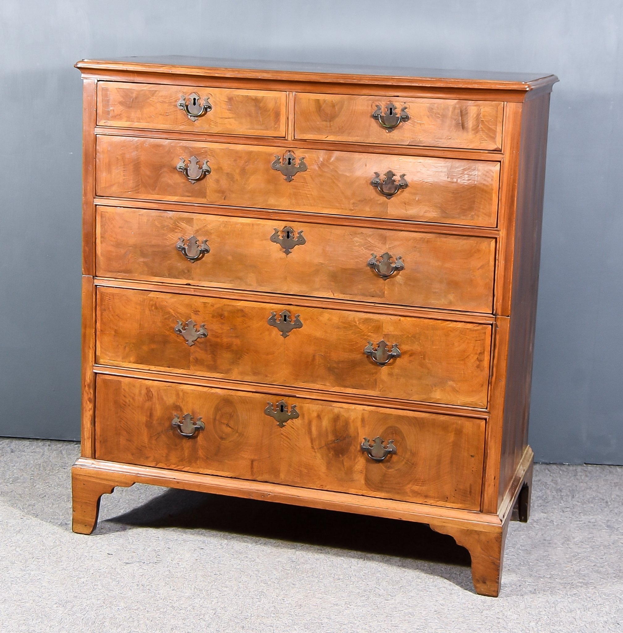 A 19th Century Walnut Chest in Two Sections, with moulded edge to top, fitted two short and four