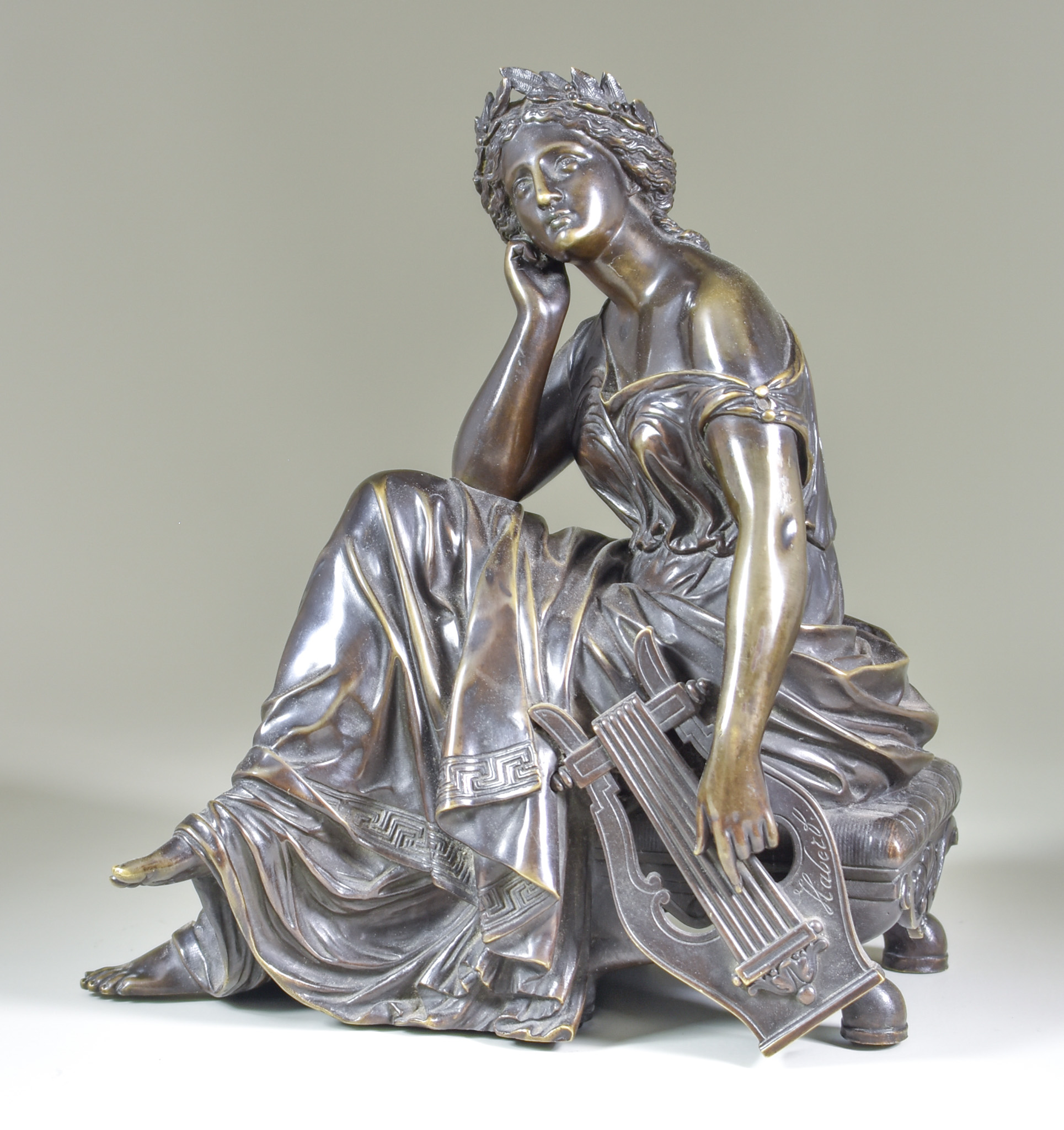 Late 19th Century School - Brown patinated bronze figure of a Muse of Music, and modelled as a