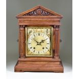 A Late 19th Century Oak-Cased Mantel Clock, by Winterhalder & Hofmeier, the 7ins square brass dial