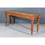 A 19th Century Mahogany Rectangular "Pub" Table, the solid top with square edge, on turned legs,