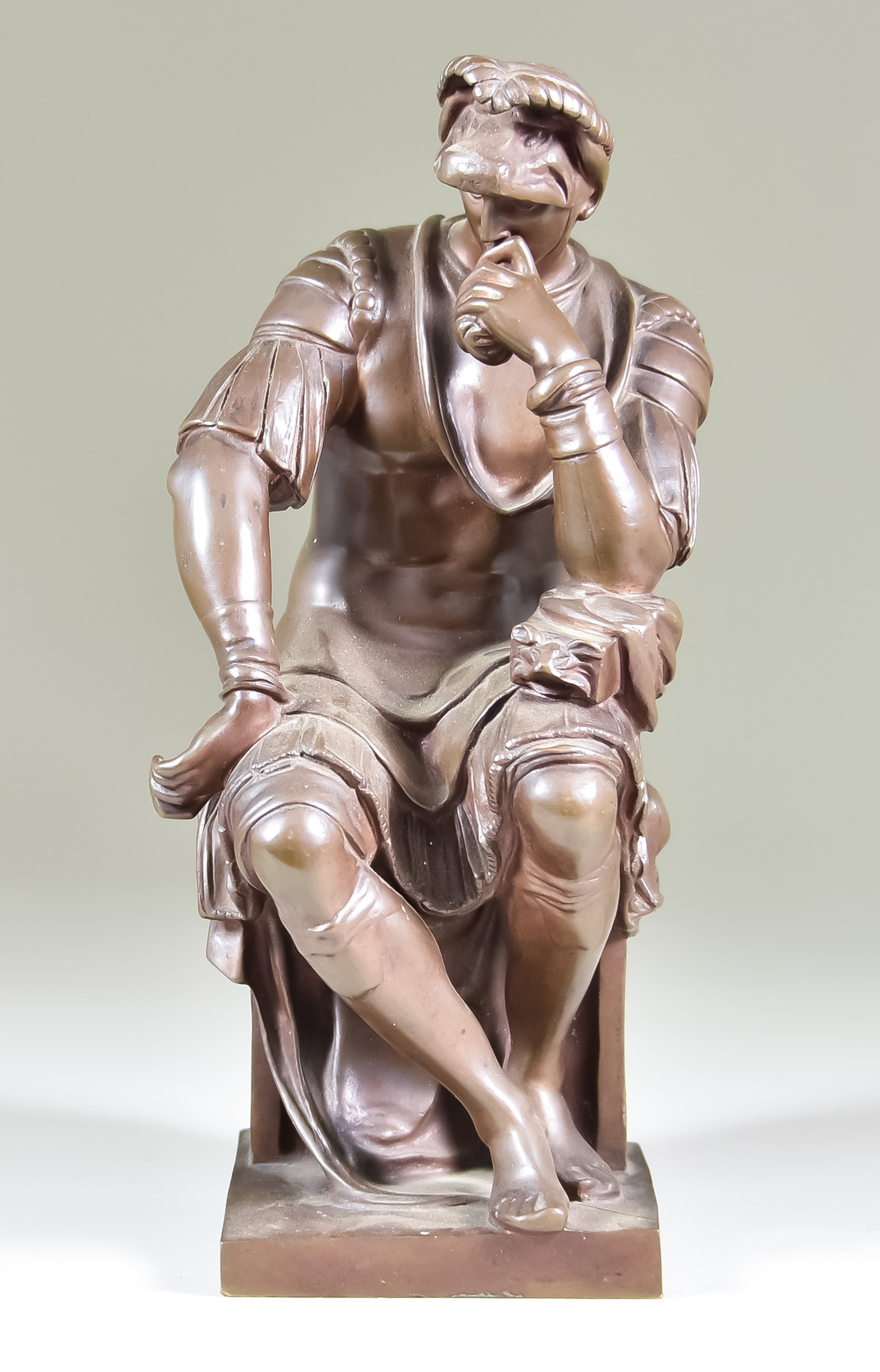 French School After Michelangelo, Patinated Bronze Figure of a seated Roman soldier cast by The