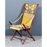 A Stained Beechwood Framed Folding Campaign Chair, the seat and back upholstered in old gold