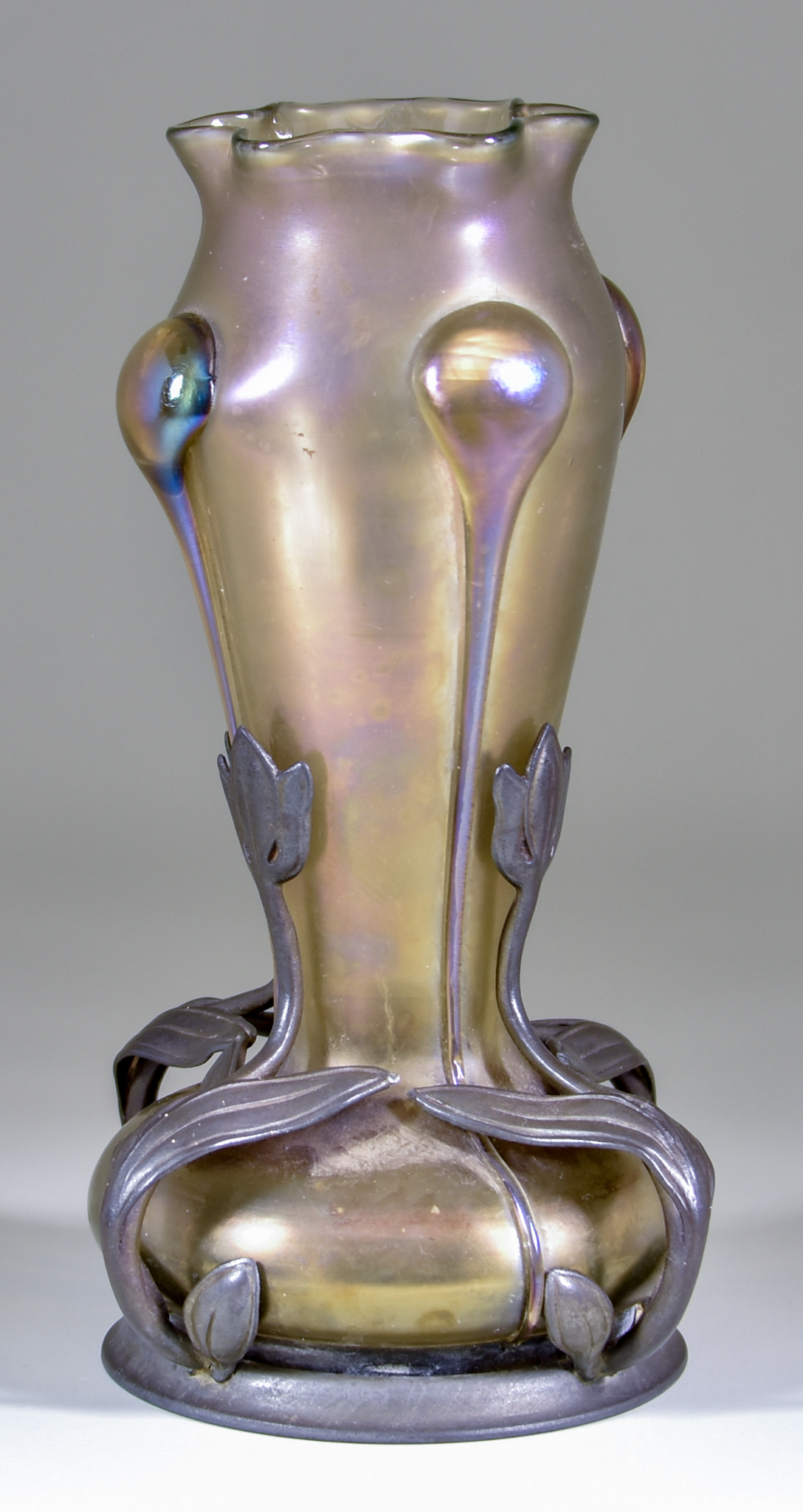 A Loetz Vesuvian Candia Iridescent Glass Vase with Pewter Mounts, with shaped rim, the tapered