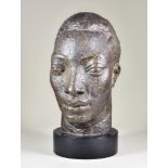 ***Hazel Armour (1894-1985) - Terracotta bust of a male, on circular base, 14ins high