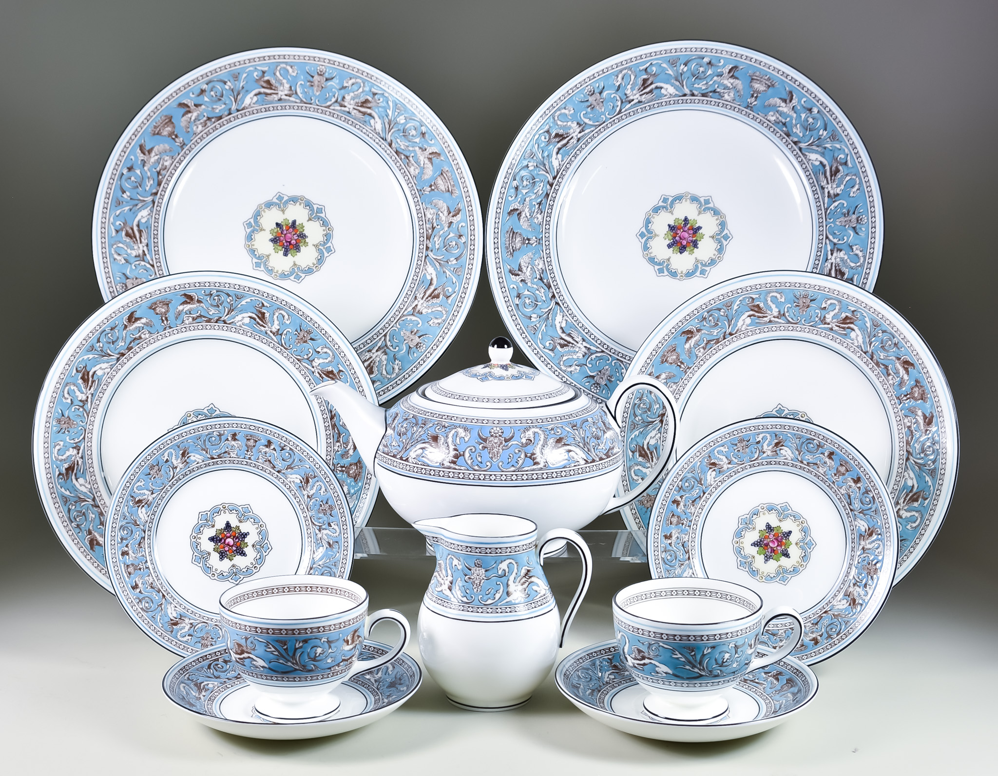 A Wedgewood Bone China "Florentine Turquoise" Pattern Tea Service, comprising - seven tea cups,