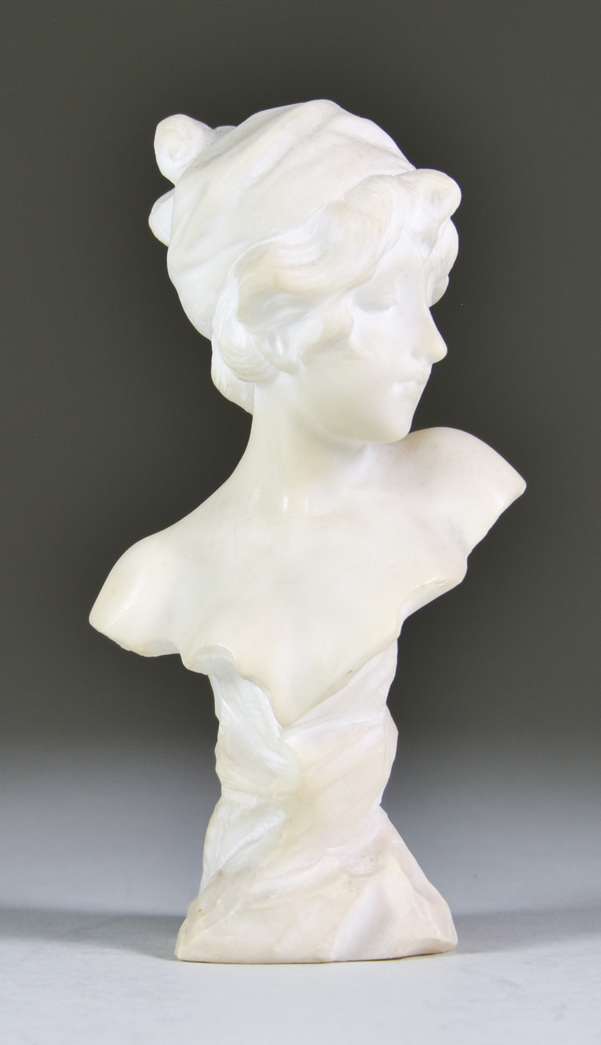 Late 19th/Early 20th Century Continental School - An alabaster bust of a young woman, unsigned, 6.