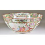 A Chinese Cantonese Porcelain Punch Bowl, 19th Century, enamelled in colours with alternating panels