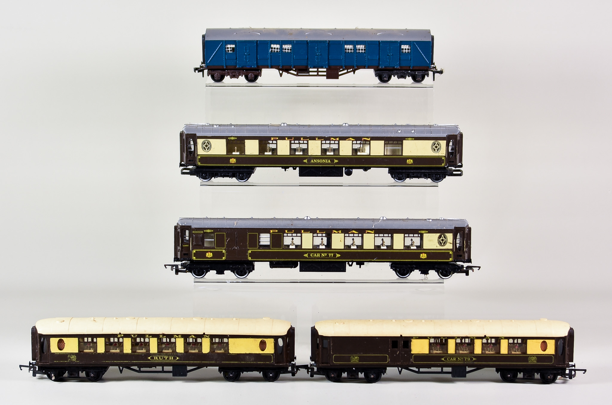 A Box of Assorted "OO" Gauge Carriages and Wagons by Hornby, comprising - seven Pullman Coaches, one