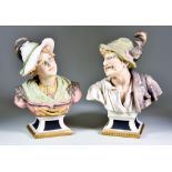 A Pair of Continental Porcelain Busts of a Tyrolean Man and Woman , each wearing hats with