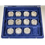 A Quantity of Silver Proof Five Pound Coins, including - twenty-three Elizabeth II 2005, to