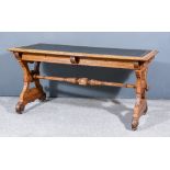 A Victorian Oak Rectangular Writing Table, with black leather inset to top and moulded edge,