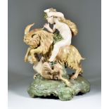 A Late 19th Century Austrian Pottery Group - Bacchanalian Putto astride a goat, a satyr beneath,