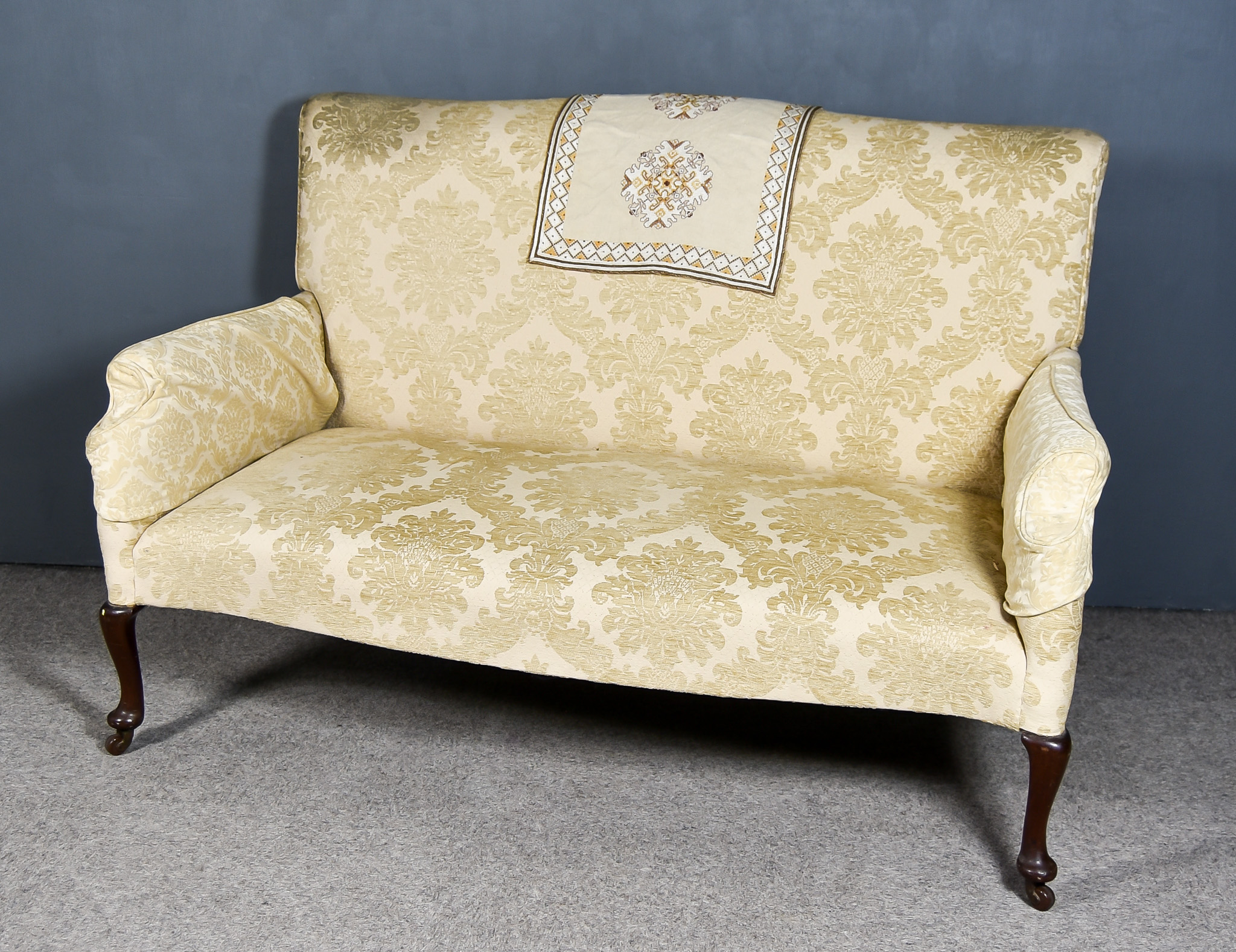 An Early 20th Century Mahogany Three Seat Settee of 18th Century Design, with shaped crest rail,