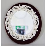 An English White Porcelain Hanging Mirror, Late 19th Century, moulded with roses, convolvulus and