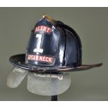 An American Fire Chief's Helmet, 20th Century, leather, marked size 7 1/8, raised badge to the front