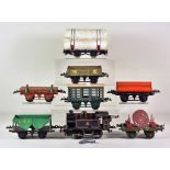 A Quantity of "O" Gauge Tin Plate Wagons and Engines, various Note: Photographic condition reports