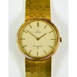 An 18ct Gold Gentleman's Manual Wind Wristwatch, by Omega, model Constellation, 32mm diameter