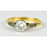 An 18ct Gold and Platinum Diamond Ring, 20th Century, centre brilliant cut white diamond,