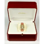 A Lady's Quartz Wristwatch, by Cartier, serial No 30010SM, model Pink Tank American, diamond