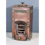 A Pitradsto Copper Stove, No.846, of hammered finish and with strapwork and pierced panels, 17ins