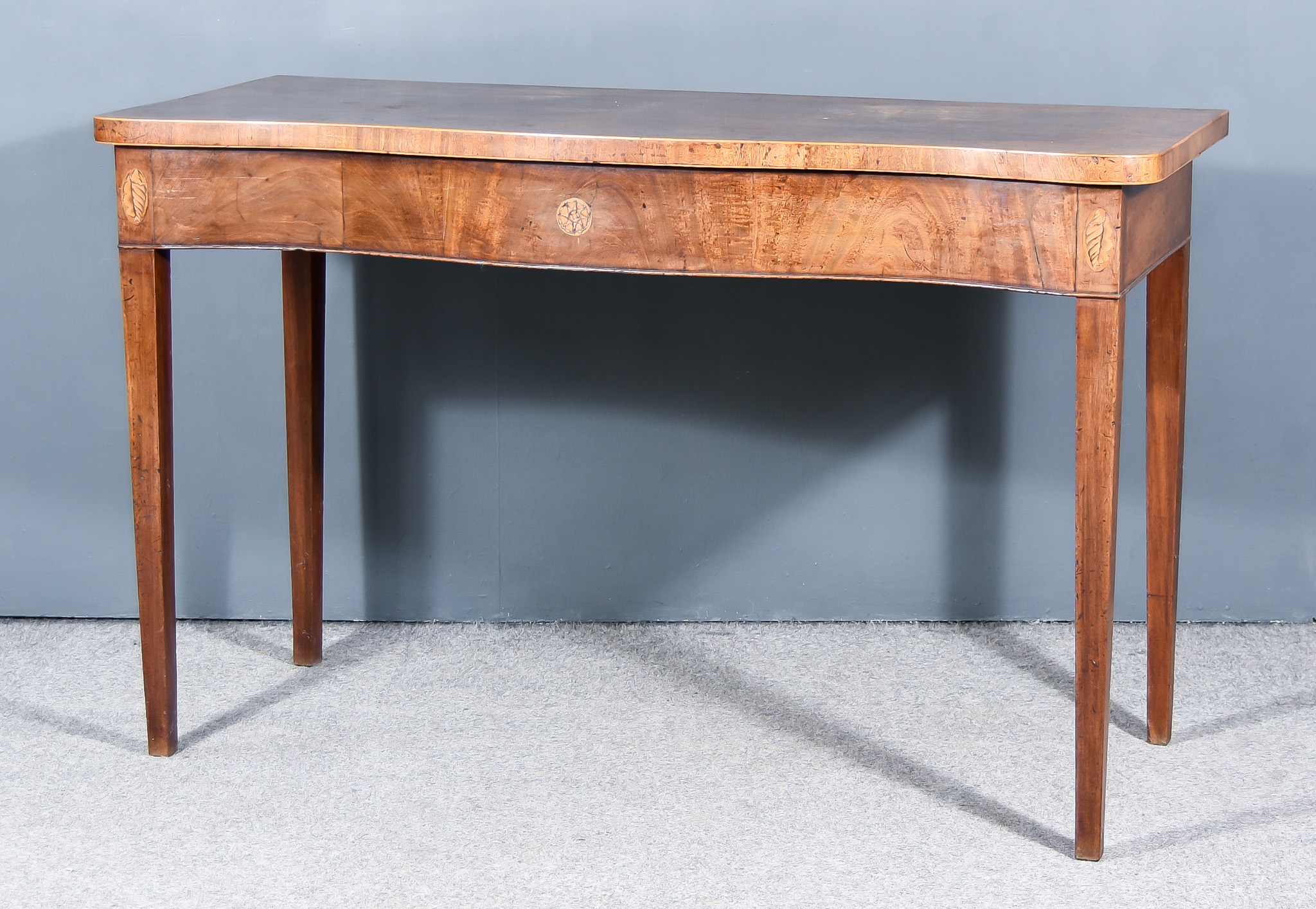 A 19th Century Mahogany Serpentine Fronted Side Table, inlaid with boxwood stringings, the deep