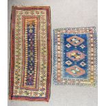 A 20th Century Runner of Kazak Design, woven in colours, the field filled with stylised floral and