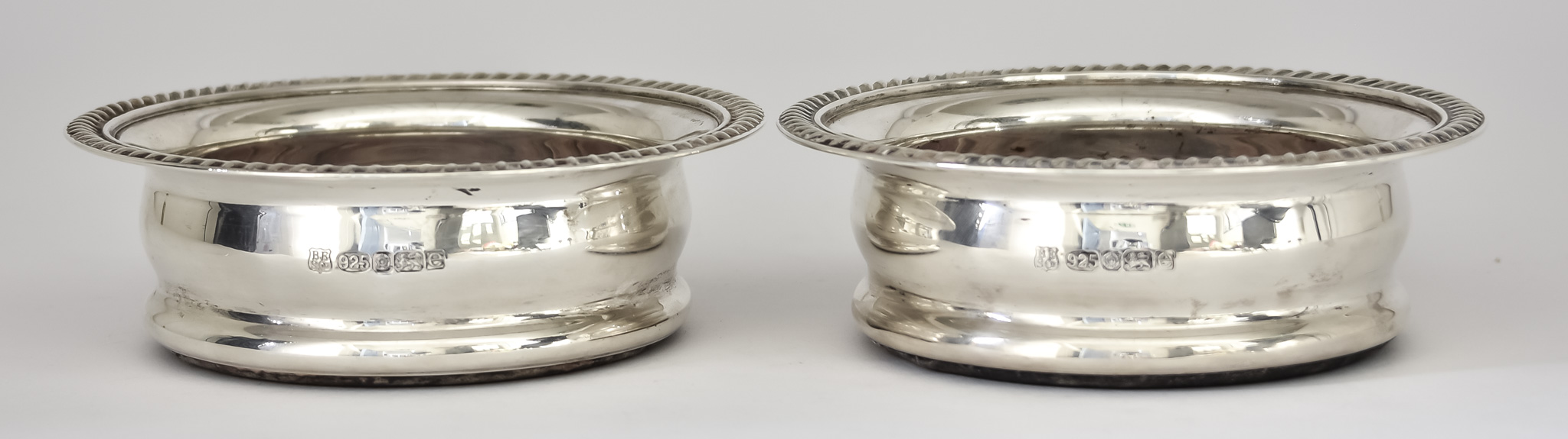 A Pair of Elizabeth II Silver Circular Coasters, by Barker Ellis Silver Co., Sheffield 2004, with