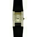 A Lady's Quartz Wristwatch, by Chaumet, Serial No. 1217998, the rectangular mother-of-pearl dial