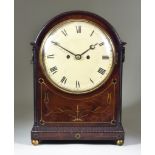 A 19th Century Mahogany Mantle Clock, the 8ins cream enamelled domed dial with Roman numerals, to