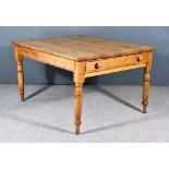 A Victorian Stripped Pine Kitchen Table, fitted one frieze drawer, on turned legs, 54ins x 41ins x